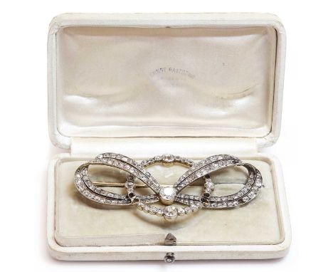 A cased former Austro-Hungarian diamond set bow and hoop brooch, by Ernest Paltsho, Vienna, c.1900,with a two row ribbon bow.