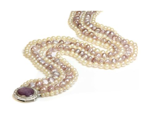 A five row graduated cultured pearl and cultured freshwater pearl necklace,with a cabochon star ruby and diamond cluster. The
