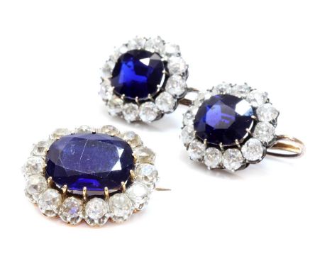 A pair of Austrian sapphire and diamond cluster earrings c.1890,the earrings with a slightly cushion shaped mixed cut sapphir