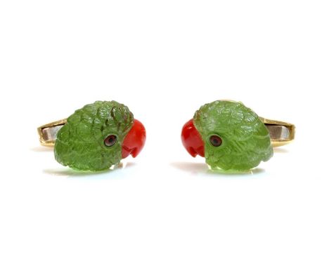A pair of 18ct gold carved peridot and coral parrot head cufflinks, by Deakin &amp; Francis, retailed by Hamilton &amp; Inche