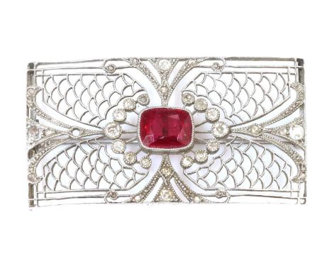 An Art Deco synthetic ruby and diamond rectangular plaque brooch,with a cushion cut synthetic ruby, milligrain set in the cen