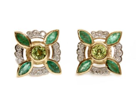 A pair of peridot, emerald and diamond earrings, by Luke Stockley,with a circular mixed cut peridot, rub set to the centre. F