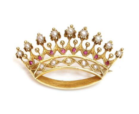 An Anglo-Indian split pearl and ruby coronet brooch, c.1900,with a row of split pearls, grain set to the band. A row of eight