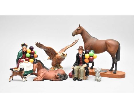 A group of Beswick comprising a Connoisseur model of Arkle; Bald Eagle model 1018; Dog praying model 2130; a small foal (repa