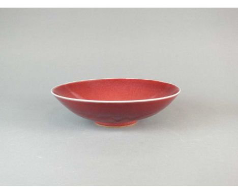 Rupert Spira (b.1960)a studio pottery bowl covered in a copper red glaze, impressed seal mark,22.5cm diameterTwo small foot r