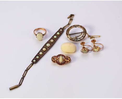A collection of opal set jewellery, comprising; an opal ring, not stamped, size N, a pair of opal cluster earrings, not stamp