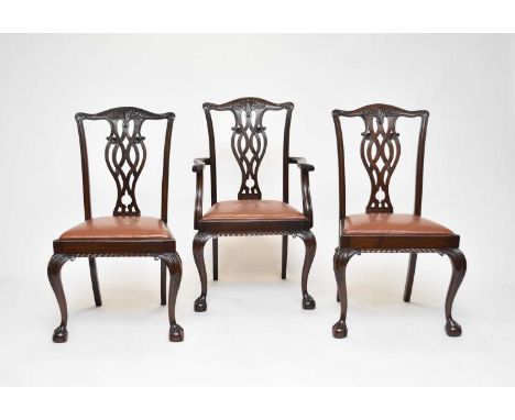A set of eight (6 + 2) Victorian mahogany dining chairs, in the manner of Thomas Chippendale, the foliate carved top rails ab