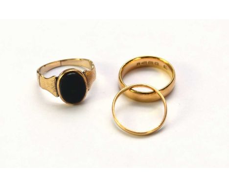 Two 22ct gold wedding bands, total weight approx 7.8g, together with a bloodstone set signet ring, size Q, weight approx 4.2g