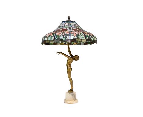 A French art deco bronzed figural lampCirca 1930, modelled as a semi-nude girl in mid dance pose with arms outstretched, fini