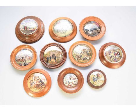 A group of framed prattware pot lidscomprising 'Red Bull Inn'; 'Dangerous (repaired)'; 'HRH The Prince of Wales Visiting the 