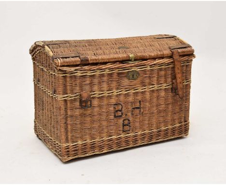 An early 20th century domed wicker trunk, by John.J.Plater &amp; Sons, the lid metal bound, with leather straps and a brass p
