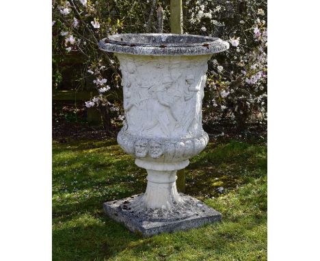 A 19th/20th century whitewashed Medici-type urn, of campana form with the body relief moulded with classical figures above a 