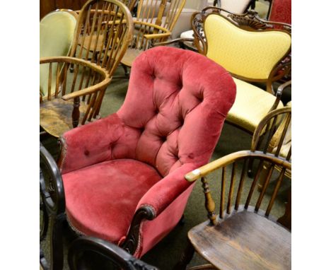 A late Victorian mahogany framed button back bedroom armchair and a spindle back Windsor armchair (2)