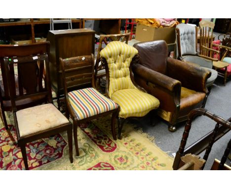 A quantity of various chairs comprising: a 1920's oak framed brown leather club chair, an oak framed part upholstered button 