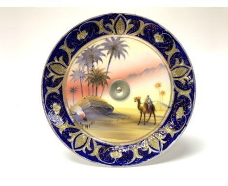 A Noritake porcelain cake stand. (D)
