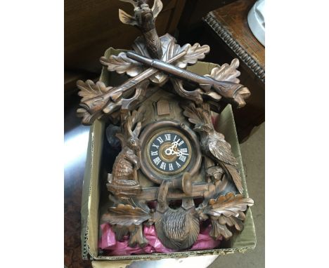 A 20th century carved wood Black Forest cuckoo clock.
