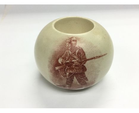 A Macintyre ceramic match strike depicting the Rudyard Kipling poem 'The Absent Minded Beggar', approx height 6.5cm. Shipping