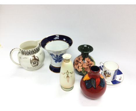 A collection of vases including Moorcroft, Poole and other ceramics including a Royal Worcester Chairmans Presentation limite