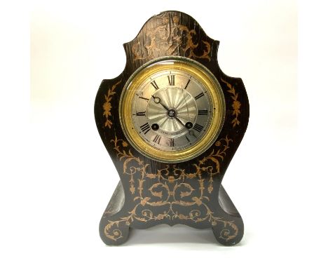 A Victorian rosewood veneered mantle clock inset with boxwood veneer, silvered dial marked Laine A Paris
