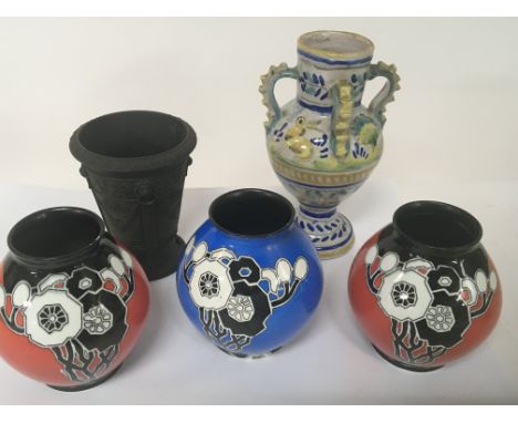 Three Carlton ware 1930 design vases the base Robert Jackson a Wedgwood black basalt Neo Classical flower vase and a painted 