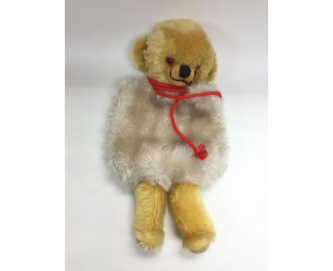 A collectable Merrythought teddy bear muff. Shipping category B.- NO RESERVE