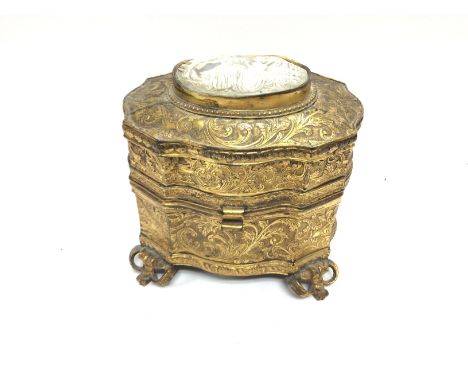 A vintage trinket box inset with a cameo. 14cm wide and 12cm tall.Postage B