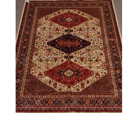 Caucasian motif carpet / wall hanging, three central diamonds over floral design cream ground spandrels geometric borders, 23