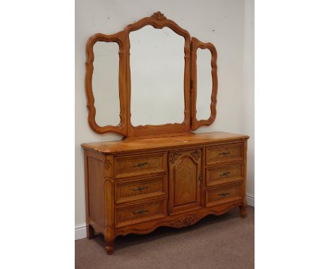 Light oak French style sideboard fitted with six drawers and centre cupboard with triple mirror back, W151cm, H191cm, D45cm C