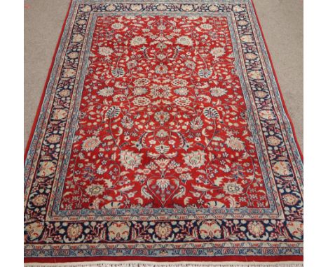 Kashan carpet all over floral design over red ground quin floral borders 250cm x 174cm  Condition Report Click here for furth