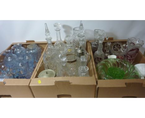 Ruby overlaid glass, coloured glass, decanters, cranberry coloured cut glass lamp and other glassware in three boxes  Conditi