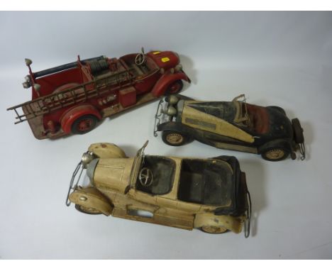 Two 1920s style reproduction model motorcars, part tin plate and one Fire engine (3) Condition Report Click here for further 