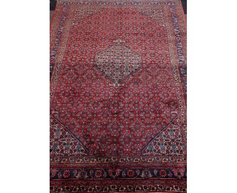 Ardabil carpet herati design central medallion over red ground, spandrels borders 280cm x 192cm Condition Report Click here f