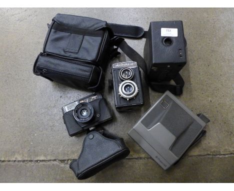 Four cameras and a camera case 