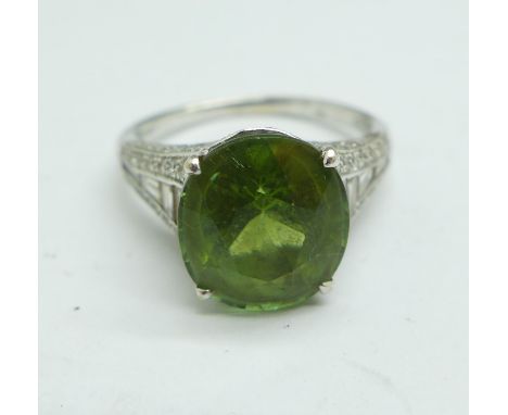 An 18ct white gold, tourmaline and diamond ring,4g, K, (with insurance valuation dated 30/12/10 for £2450) 