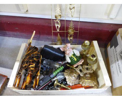 Two boxes of assorted items including a model loco, pig money bank, novelty jazz band, candlesticks and a model elephant 