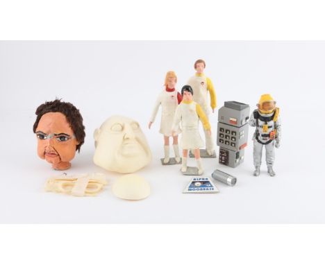 Gerry Anderson - Collection of replica props including Puppet Head casts, Alpha Badge from the Fanderson club and other items