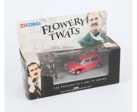 Corgi 00802 Fawlty Towers Austin 1300 Estate diecast model with Basil Fawlty figure in 'Flowery Twats' window box. Very few o