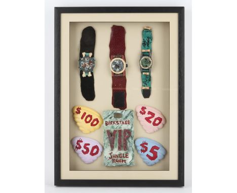 The Flintstones - Framed display of props from the movie including three watches (one dual signed), four casino chips and a b