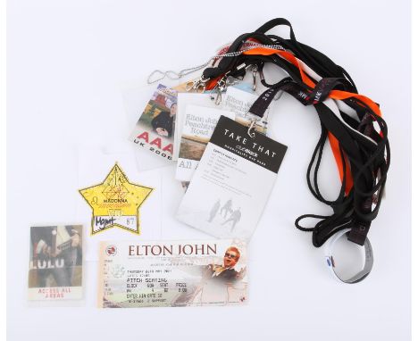 Two ticket stubs including Elton John 2005 and a VIP pass to Madonna's 'invention' world tour, 2004. Various guest passes inc