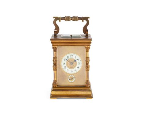 the Arabic numeral dial and subsidiary alarm dial in a matt gilt mask and column case, the movement with gong strike and push