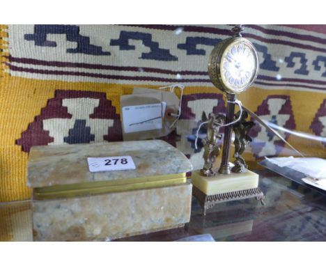 An onyx and brass desk clock with musical putti H 21cm together with an onyx box (2)