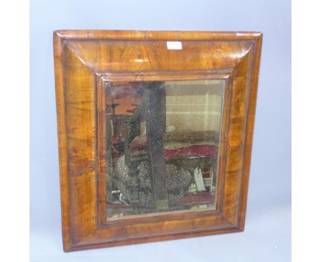 A late 18th / Early 19th century walnut cushion mirror with bevelled plate 65 x 58cm 