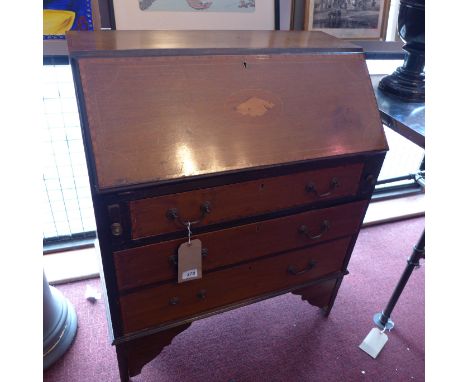 An Edwardian marquetry inlaid bureau with hinged flap above three drawers, raised on carved bracket feet. H-92cm, W-75cm, D-4