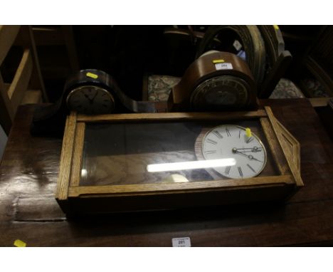 A modern oak cased drop dial wall clock; together with two mantel clocks