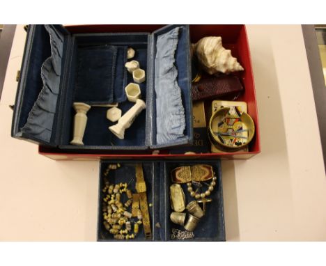 A tray containing costume jewellery; playing cards; a bangle; sea shell; compacts etc.