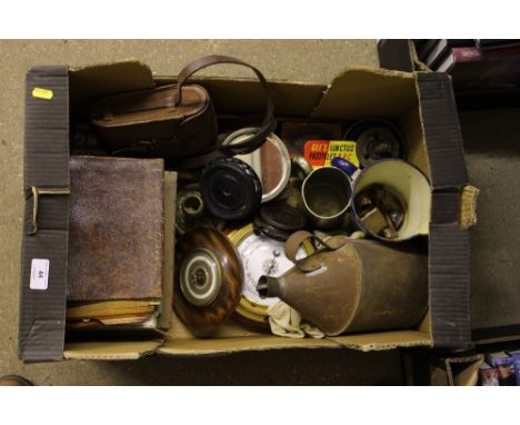 A box containing a camera, tankards, enamel jug, old oil can etc.
