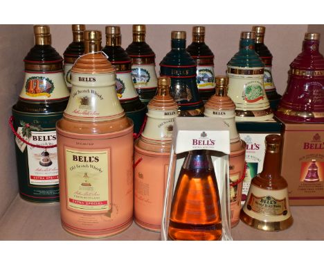 BELL'S WHISKY, fourteen Bell's Whisky Porcelain Decanters comprising nine 'CHRISTMAS' Extra Special Old Scotch Whisky Decante