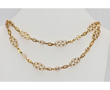 A YELLOW METAL NECKLACE, designed as a series of openwork scrolling links with hook clasp, approximate length 500mm, approxim
