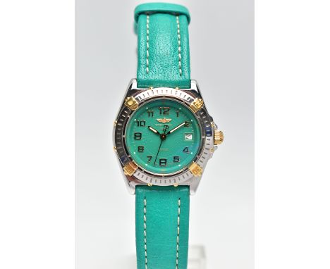 A BREITLING 'WINGS' BI-COLOUR QUARTZ WRISTWATCH, the turquoise coloured dial, with gilt Arabic numerals, illuminous gilt hand