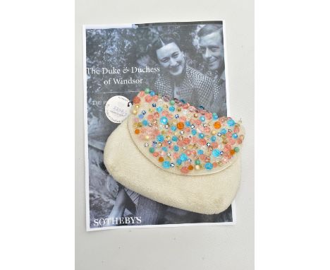 DUKE AND DUCHESS OF WINDSOR INTEREST, a Bergdorf Goodman coloured and white beaded pochette, the two division interior bears 